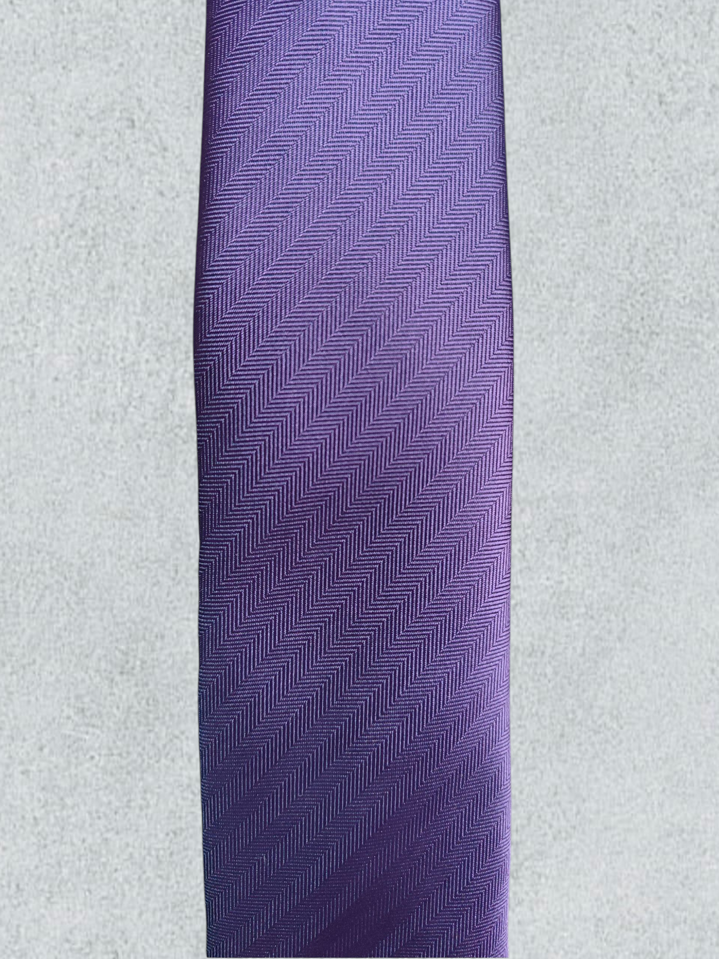 Purple Tie With A Herringbone Pattern