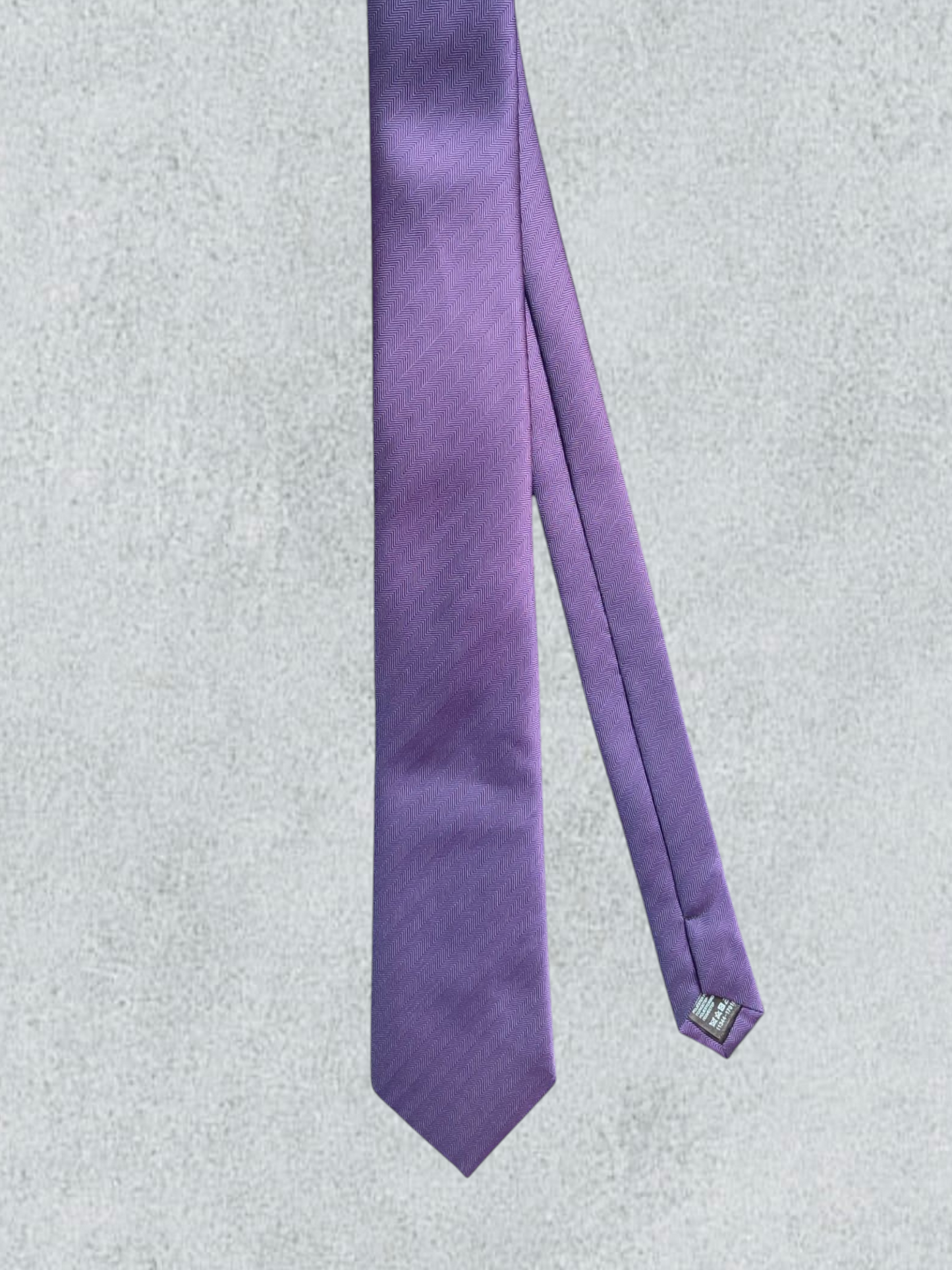 Purple Tie With A Herringbone Pattern