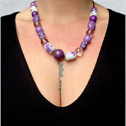 Mauve Beaded Necklace With Decorative Ceramic Accents