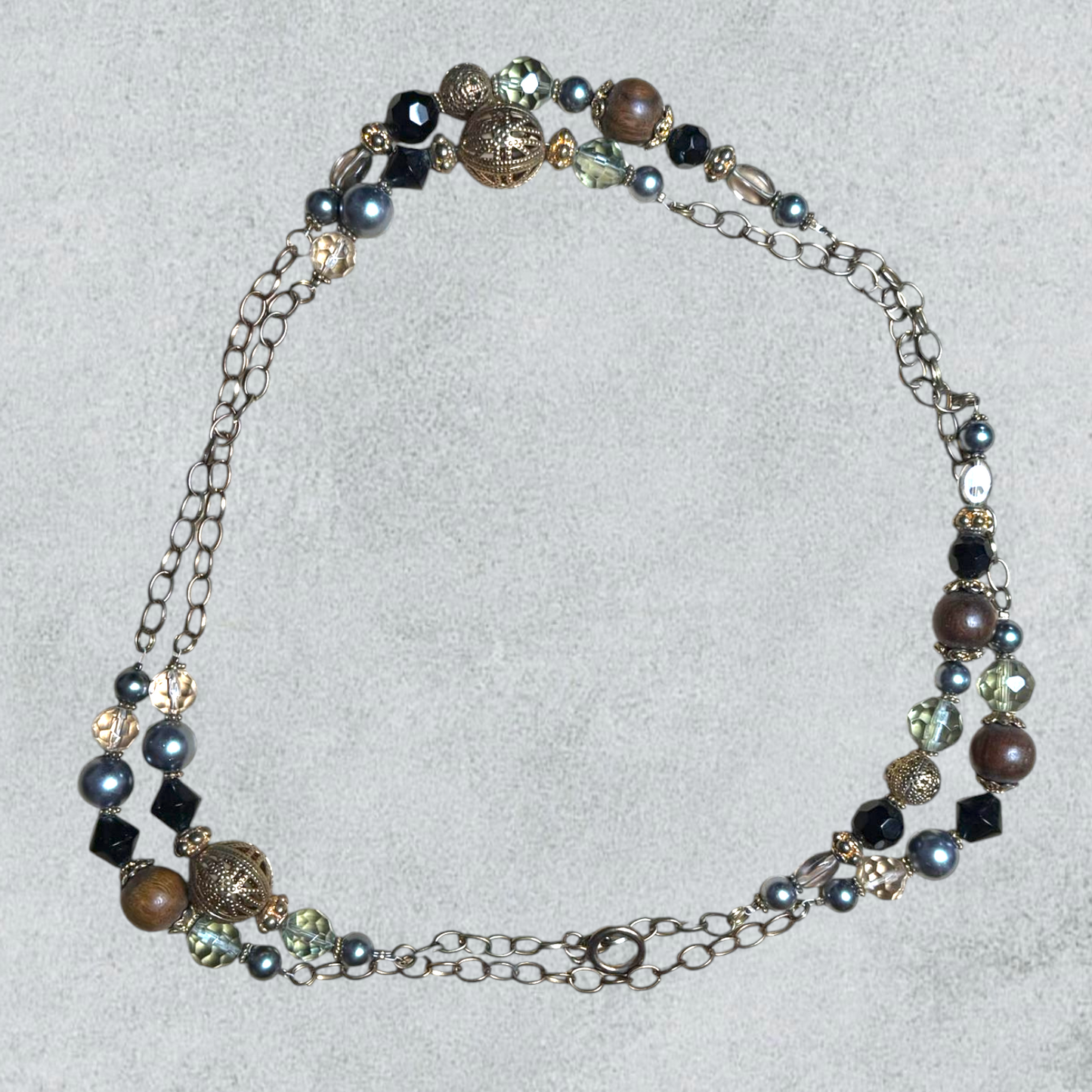 Long Beaded Necklace with Metallic and Crystal Accents