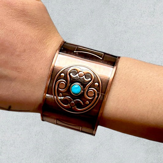 Copper Band Bracelet With A Celtic Motif And An Amethyst Stone