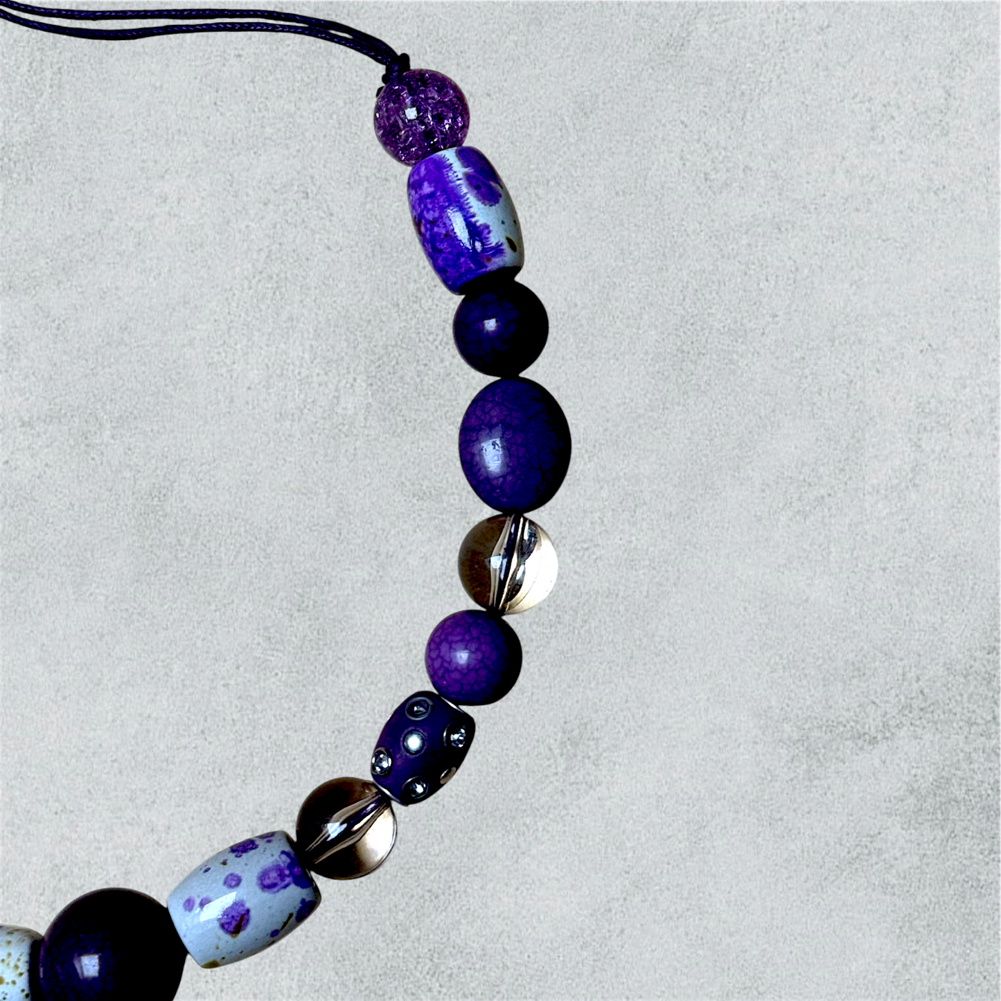 Mauve Beaded Necklace With Decorative Ceramic Accents