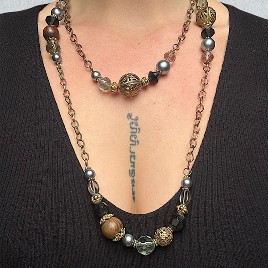 Long Beaded Necklace with Metallic and Crystal Accents