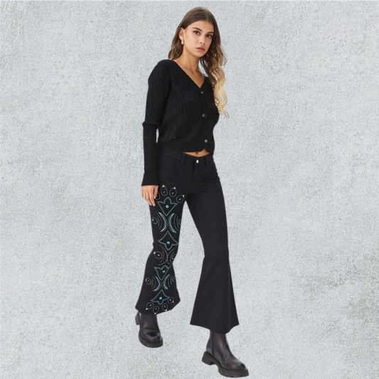 Black Flared Trousers With Embroidered And Beaded Decorations.