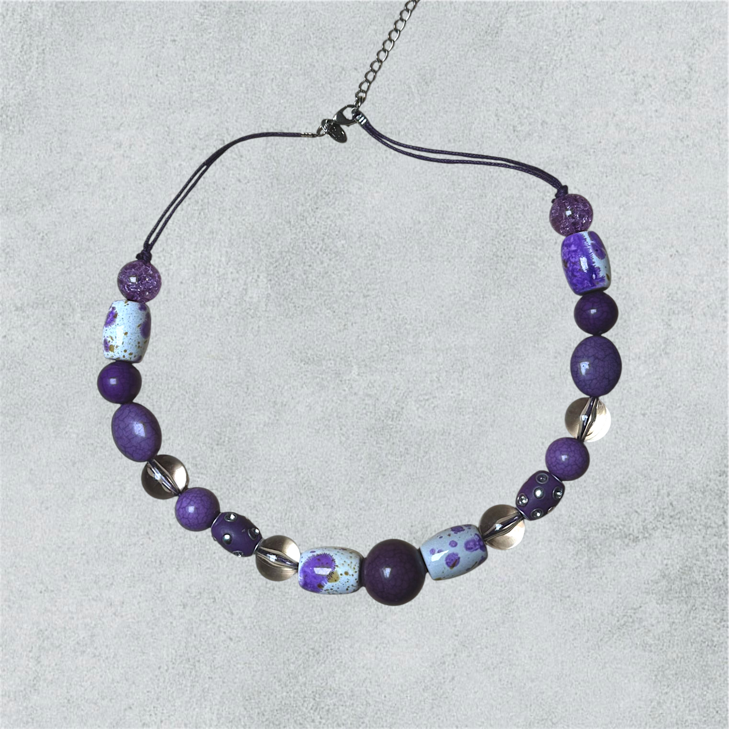 Mauve Beaded Necklace With Decorative Ceramic Accents
